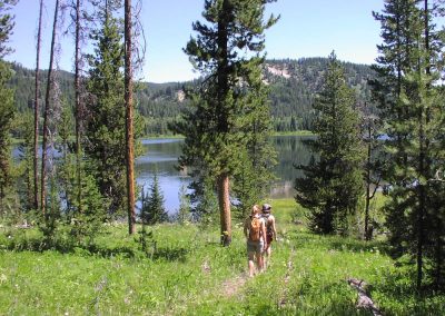 Hikers Approaching Two Ocean Lake Grand Teton National Park - Lazy L&B Ranch Wyoming