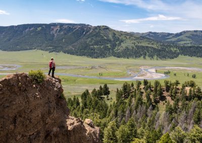 Hiker overlooking Lamar Valley Yellowstone National Park - Lazy L&B Dude Ranch Wyoming